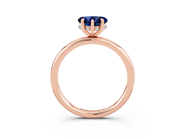 Rose gold Heart Cut Blue Sapphire Solitaire Ring with Thin Band and Four-Prong Setting