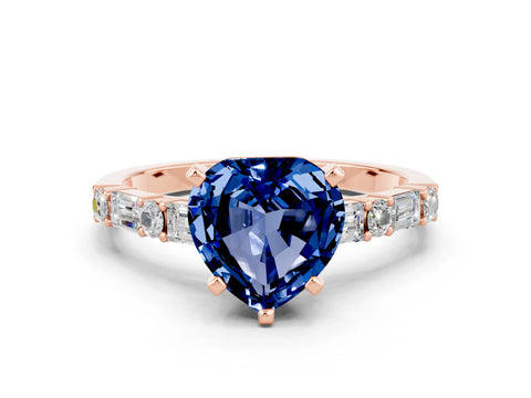 Rose gold Heart Cut Blue Sapphire Solitaire with Side Baguettes and Channel Set Band