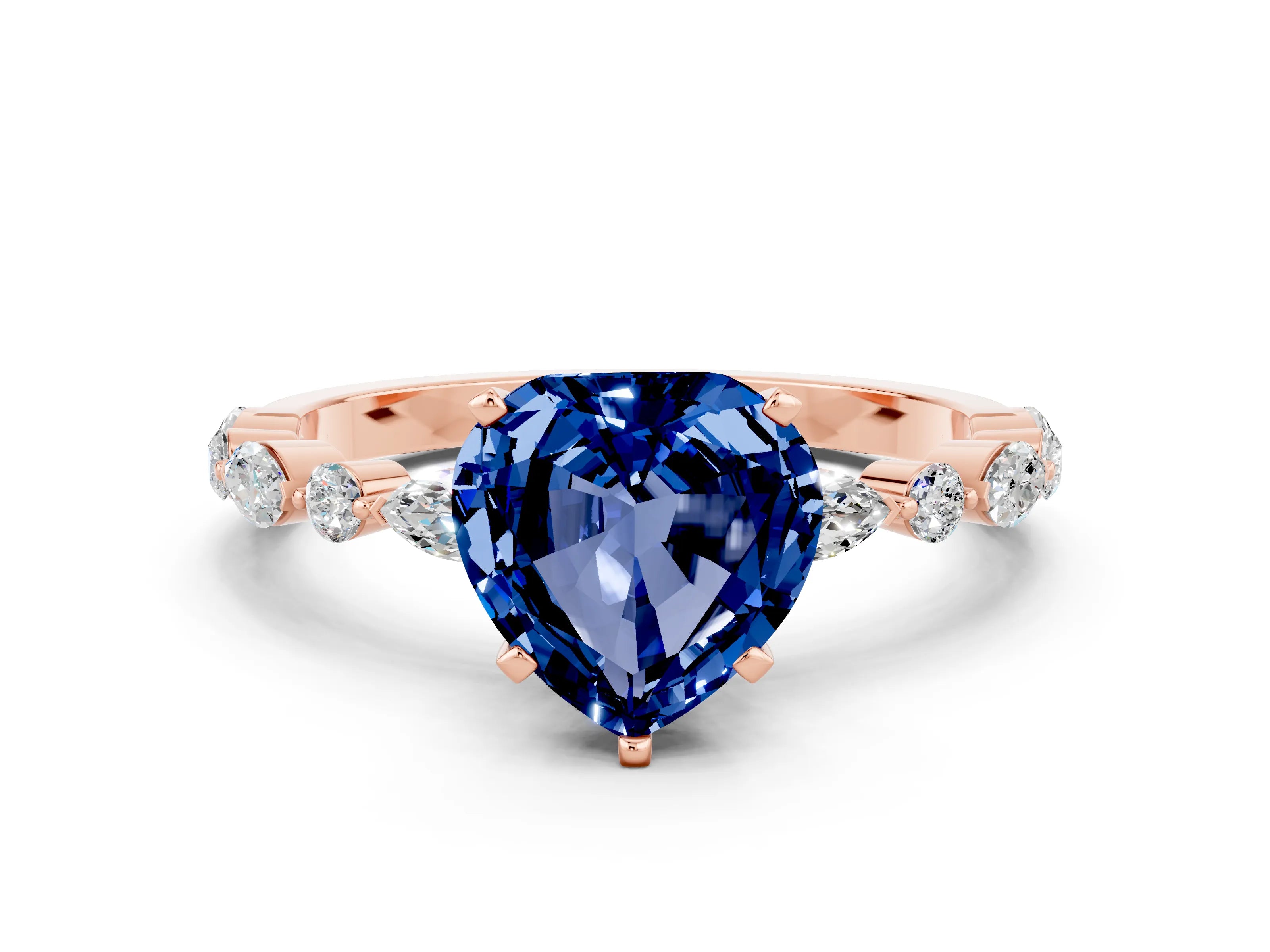 Rose gold Heart Cut Blue Sapphire Solitaire with Side Stones on a Pavé Band and Four-Prong Setting