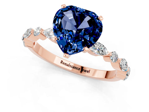 Rose gold Heart Cut Blue Sapphire Solitaire with Side Stones on a Pavé Band and Four-Prong Setting_1