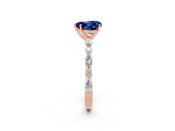 Rose gold Heart Cut Blue Sapphire Ring with Marquise and Round  Side Stones and Four-Prong Setting