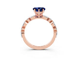 Rose gold Heart Cut Blue Sapphire Solitaire with Side Stones on a Pavé Band and Four-Prong Setting_3