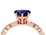 Rose gold Heart Cut Blue Sapphire Solitaire with Side Stones on a Pavé Band and Four-Prong Setting_4