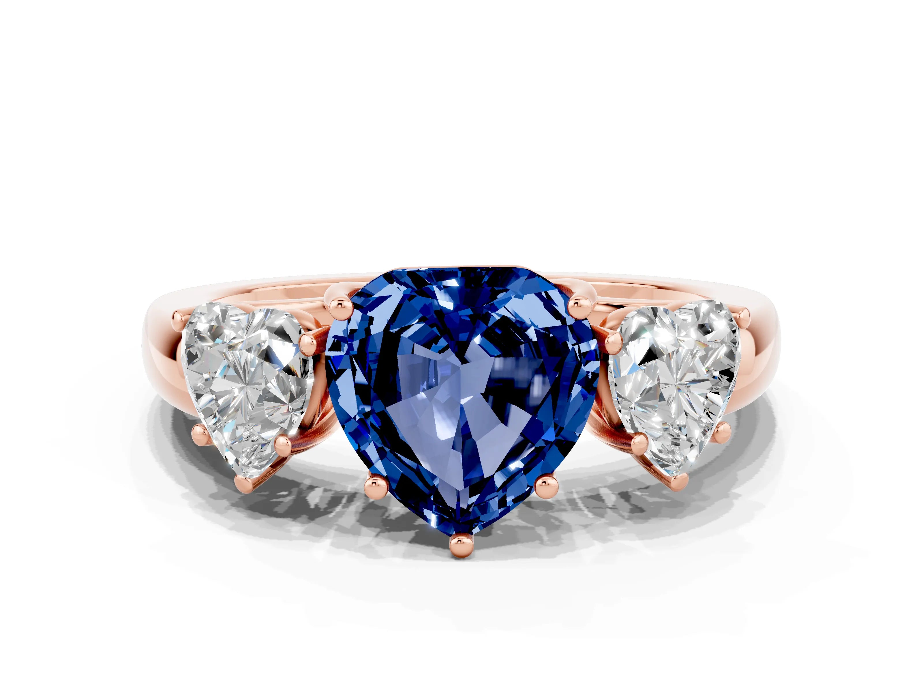Rose gold Heart Cut Blue Sapphire Three-Stone Ring with Four-Prong Setting and Classic Band