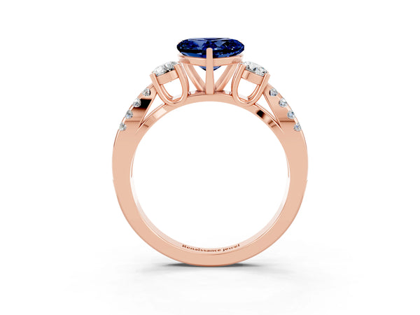 Rose gold Heart Cut Blue Sapphire Three-Stone Ring with Pavé Split Shank and Four-Prong Setting