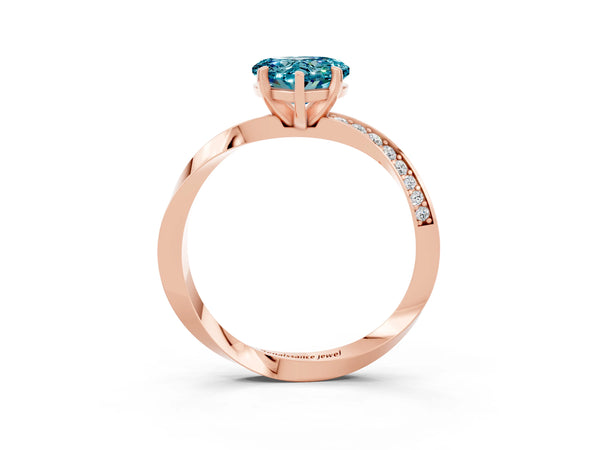 Rose gold Heart Cut Blue Topaz Engagement Ring with Side Stone Accents and Four-Prong Setting