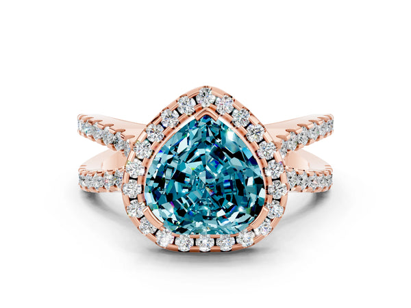 Rose gold Heart Cut Blue Topaz Halo Ring with Split Shank Pavé Band and Prong Setting