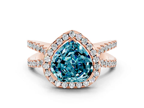 Rose gold Heart Cut Blue Topaz Halo Ring with Split Shank Pavé Band and Prong Setting