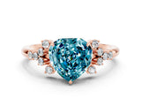 Rose gold Heart Cut Blue Topaz Ring with Side Stones and Four-Prong Setting_36