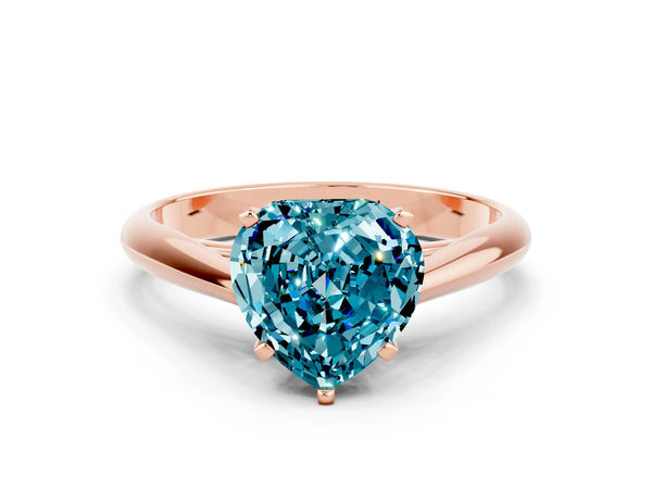Rose gold Heart Cut Blue Topaz Solitaire Engagement Ring with Cathedral Setting and Four-Prong Mount
