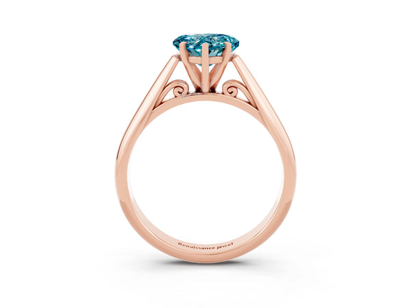 Rose gold Heart Cut Blue Topaz Solitaire Engagement Ring with Cathedral Setting and Four-Prong Mount