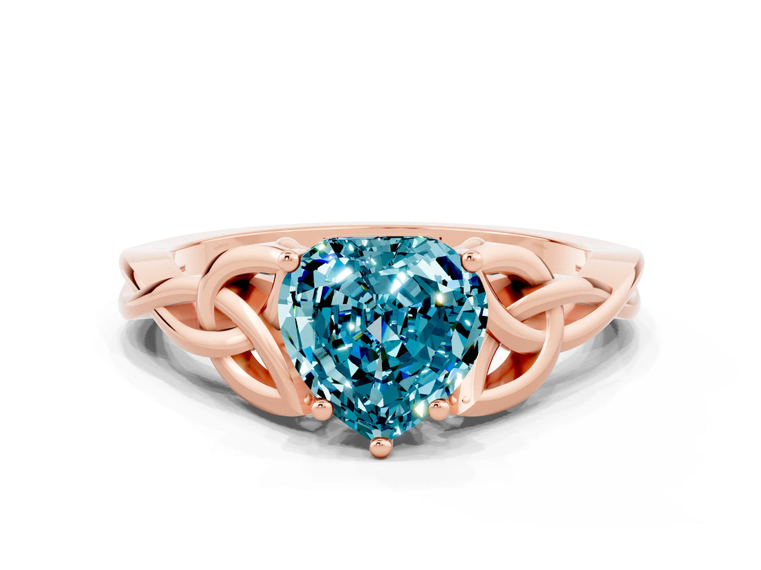 Rose gold Heart Cut Blue Topaz Solitaire Engagement Ring with Celtic Knot Band and Four-Prong Setting