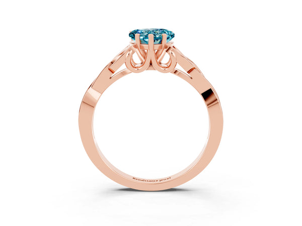 Rose gold Heart Cut Blue Topaz Solitaire Engagement Ring with Celtic Knot Band and Four-Prong Setting