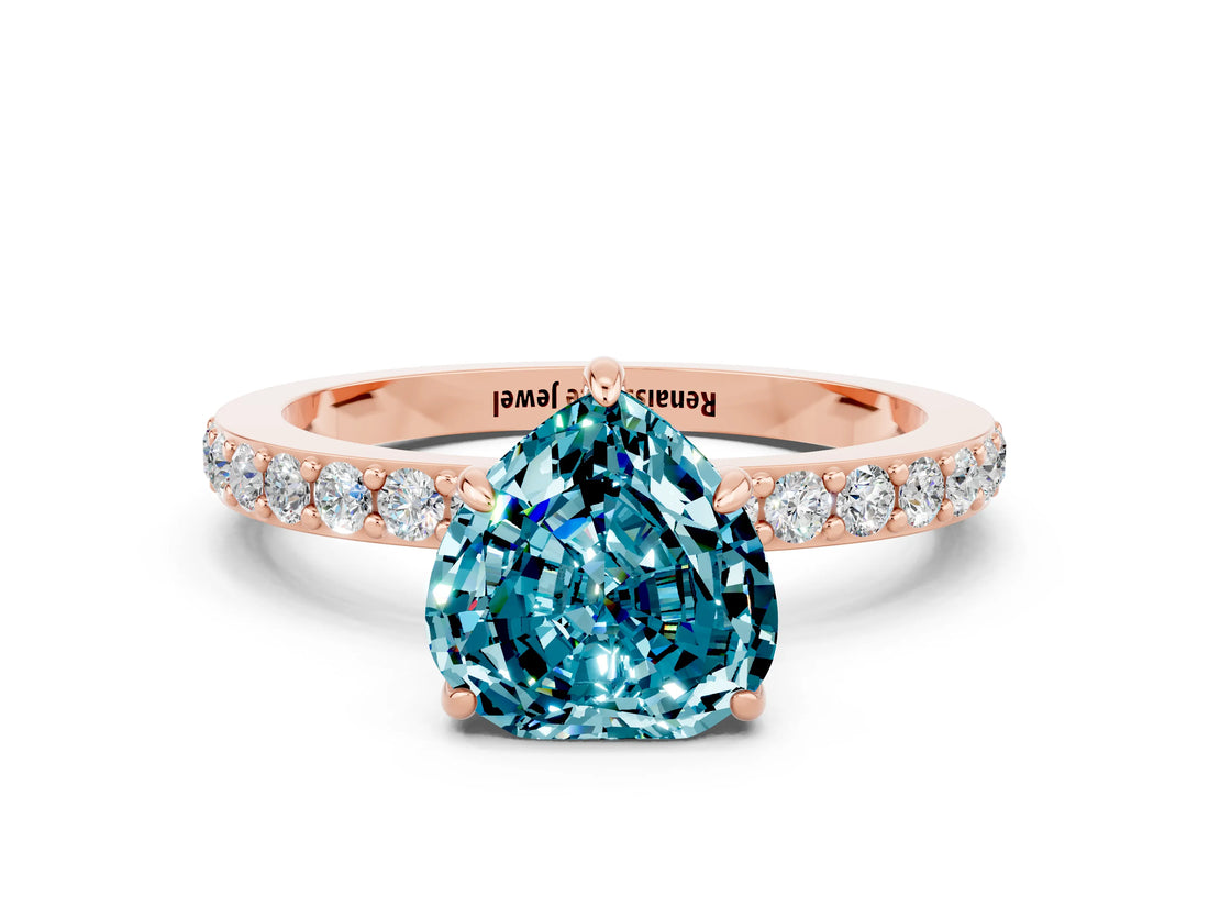 Rose gold Heart Cut Blue Topaz Solitaire Engagement Ring with Pavé Band and Four-Prong Setting