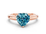 Rose gold Heart Cut Blue Topaz Solitaire Engagement Ring with Round Band and Four-Prong Setting