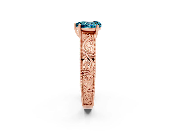 Rose gold Heart Cut Blue Topaz Solitaire Ring with Engraved Band and Four-Prong Setting