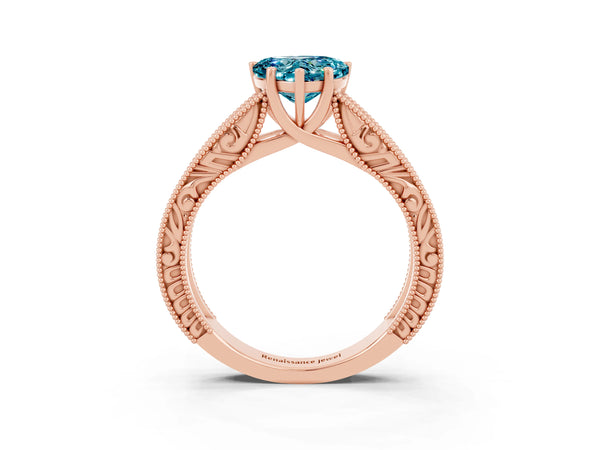 Rose gold Heart Cut Blue Topaz Solitaire Ring with Engraved Band and Four-Prong Setting