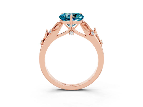 Rose gold Heart Cut Blue Topaz Solitaire Ring with Leaf Motif Band and Four-Prong Setting