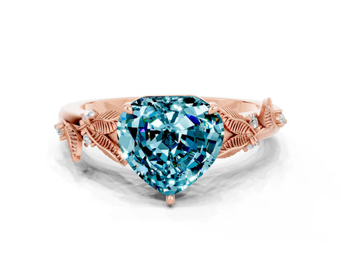 Rose gold Heart Cut Blue Topaz Solitaire Ring with Leaf Motif Band and Four-Prong Setting