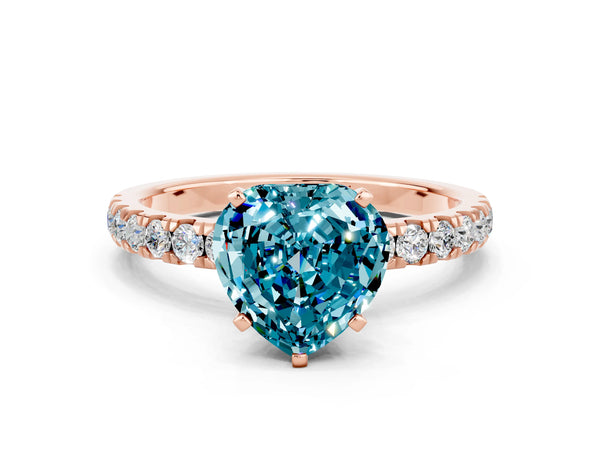 Rose gold Heart Cut Blue Topaz Solitaire Ring with Pavé Accents and Four-Prong Setting