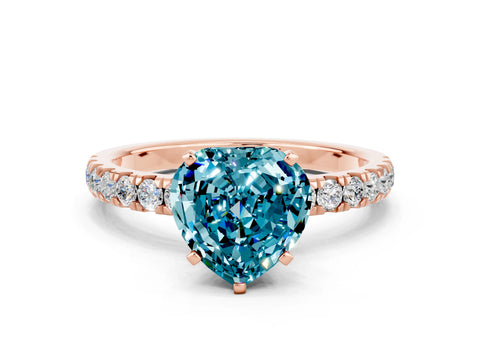 Rose gold Heart Cut Blue Topaz Solitaire Ring with Pavé Accents and Four-Prong Setting