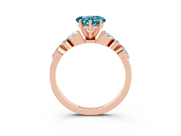 Rose gold Heart Cut Blue Topaz Solitaire Ring with Side Stones and Four-Prong Setting