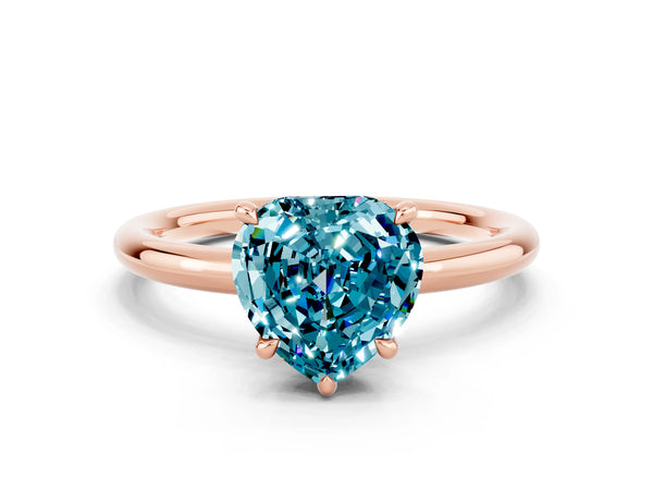 Rose gold Heart Cut Blue Topaz Solitaire Ring with Thin Band and Four-Prong Setting