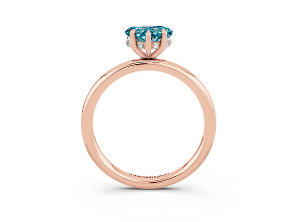 Rose gold Heart Cut Blue Topaz Solitaire Ring with Thin Band and Four-Prong Setting