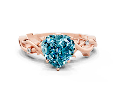 Rose gold Heart Cut Blue Topaz Solitaire Ring with Twisted Band and Prong Setting