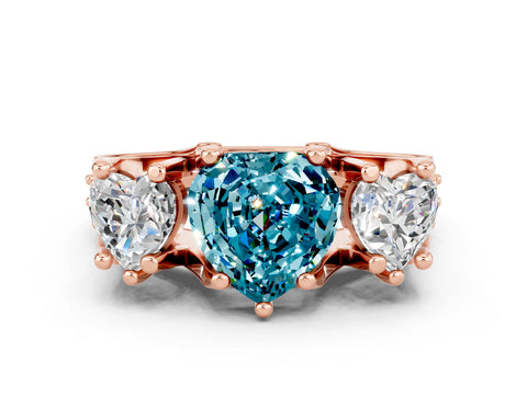 Rose gold Heart Cut Blue Topaz Three-Stone Ring with Channel Set Band and Four-Prong Setting