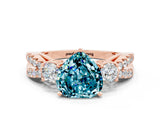Rose gold Heart Cut Blue Topaz Three-Stone Ring with Pavé Split Shank and Four-Prong Setting