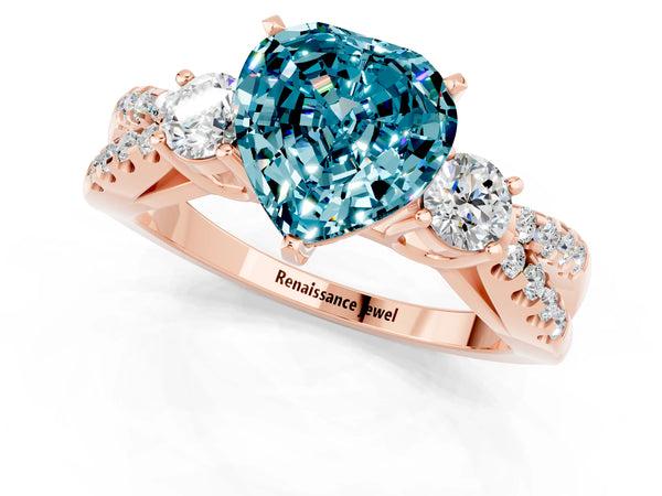 Rose gold Heart Cut Blue Topaz Three-Stone Ring with Pavé Split Shank and Four-Prong Setting
