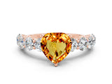 Rose gold Heart Cut Citrine Prong Setting with Side Stones on a Pave Band