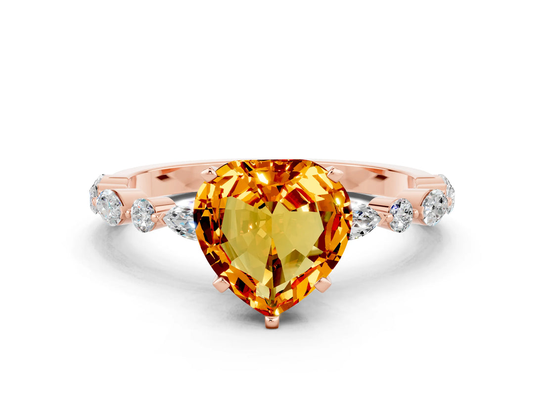 Rose gold Heart Cut Citrine Solitaire with Side Stones on a Pavé Band and Four-Prong Setting