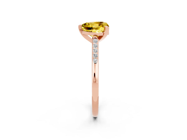 Rose gold Heart Cut Yellow Sapphire Solitaire Ring with Channel Set Round Band and Prong Setting