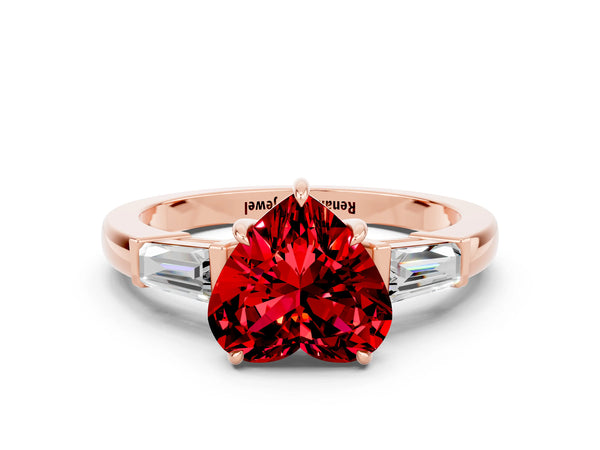 Rose gold Heart Cut Cut Diamond Ring with Tapered Baguette Side Stones in Four-Prong Setting