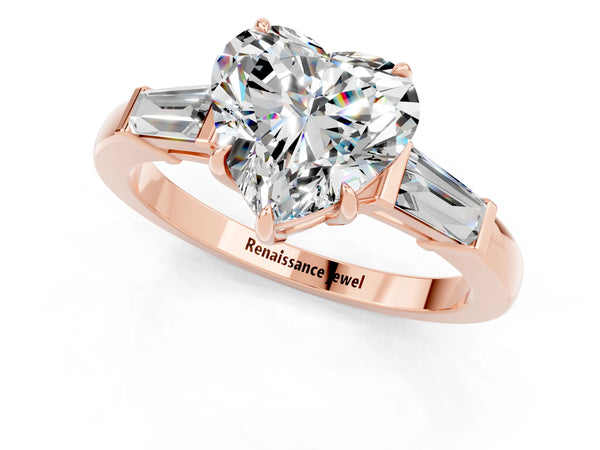 Rose gold Heart Cut Moissanite Three-Stone Ring with Tapered Baguette Side Stones and Prong Setting