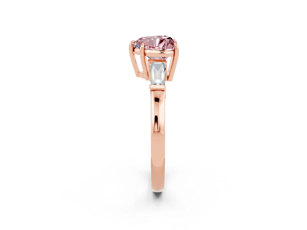 Rose gold Heart Cut Cut Diamond Ring with Tapered Baguette Side Stones in Four-Prong Setting