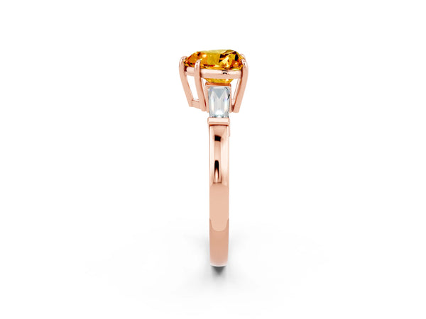 Rose gold Heart Cut Citrine Three-Stone Ring with Tapered Baguette Side Stones and Prong Setting