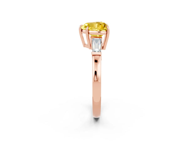 Rose gold Heart Cut Yellow Sapphire Three-Stone Ring with Tapered Baguette Side Stones and Prong Setting
