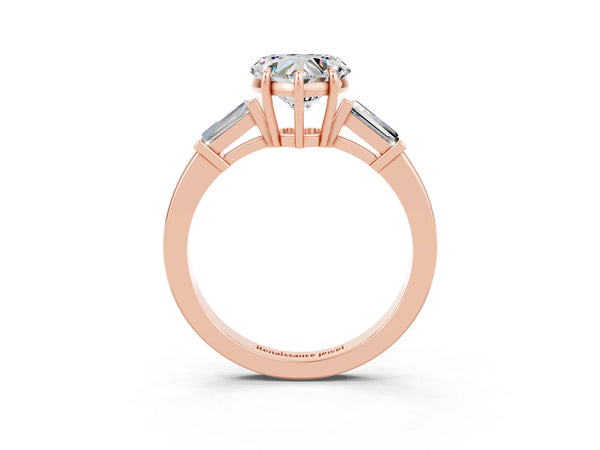 Rose gold Heart Cut Moissanite Three-Stone Ring with Tapered Baguette Side Stones and Prong Setting