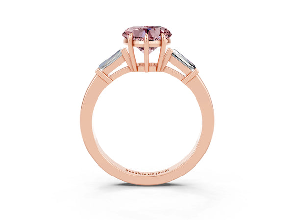 Rose gold Heart Cut Cut Diamond Ring with Tapered Baguette Side Stones in Four-Prong Setting