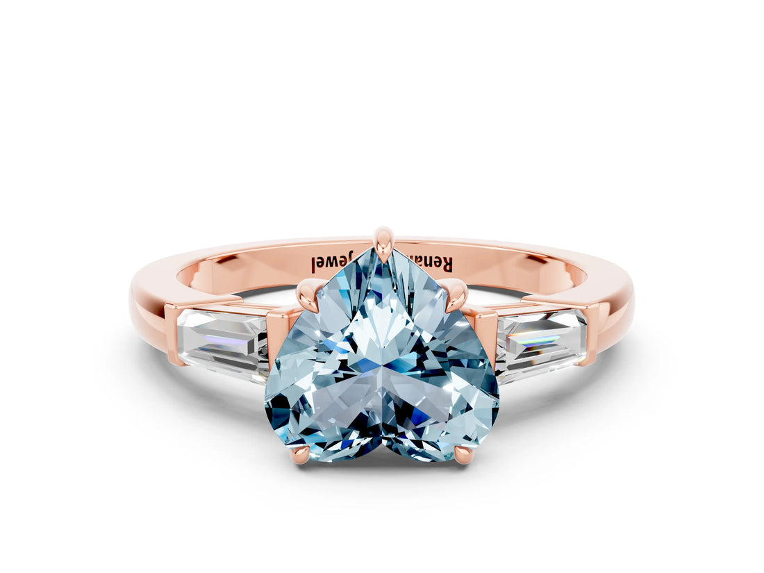Rose gold Heart Cut Cut Diamond Ring with Tapered Baguette Side Stones in Four-Prong Setting