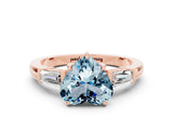 Rose gold Heart Cut Cut Diamond Ring with Tapered Baguette Side Stones in Four-Prong Setting