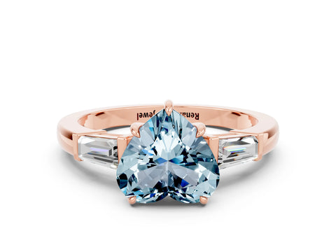Rose gold Heart Cut Cut Diamond Ring with Tapered Baguette Side Stones in Four-Prong Setting
