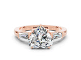 Rose gold Heart Cut Cut Diamond Ring with Tapered Baguette Side Stones in Four-Prong Setting