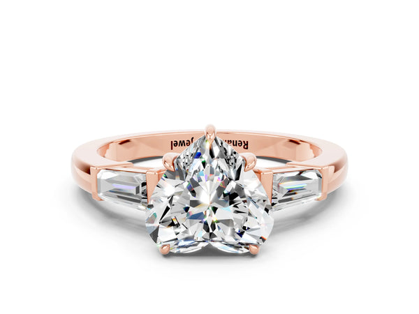 Rose gold Heart Cut Moissanite Three-Stone Ring with Tapered Baguette Side Stones and Prong Setting