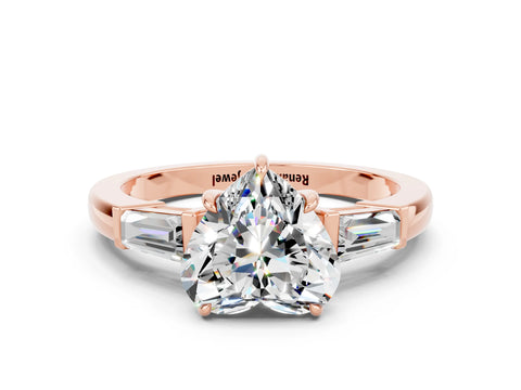 Rose gold Heart Cut Cut Diamond Ring with Tapered Baguette Side Stones in Four-Prong Setting