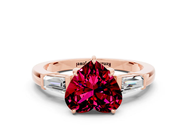 Rose gold Heart Cut Garnet Three-Stone Ring with Tapered Baguette Side Stones and Prong Setting