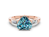 Rose gold Heart Cut Cut Diamond Ring with Tapered Baguette Side Stones in Four-Prong Setting